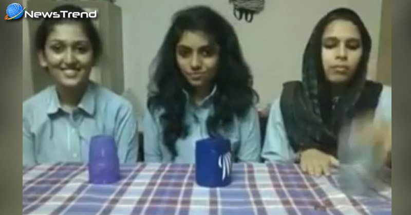 3 girls singing with cup beats