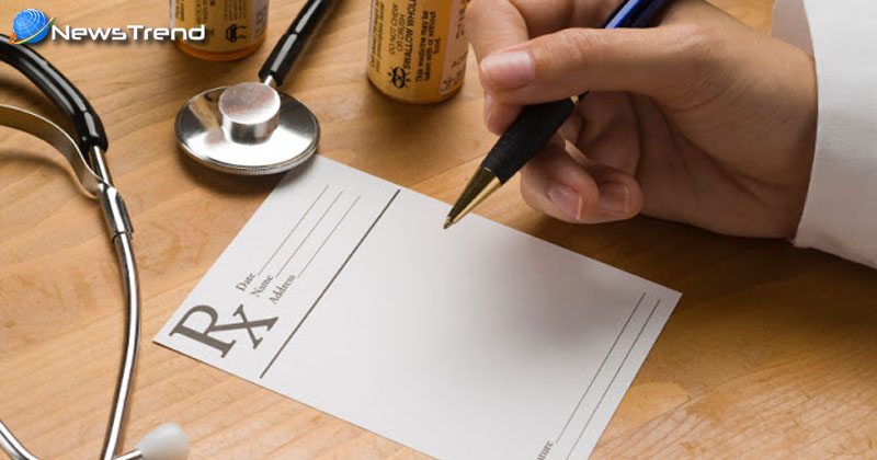 doctor write rx on drug prescription