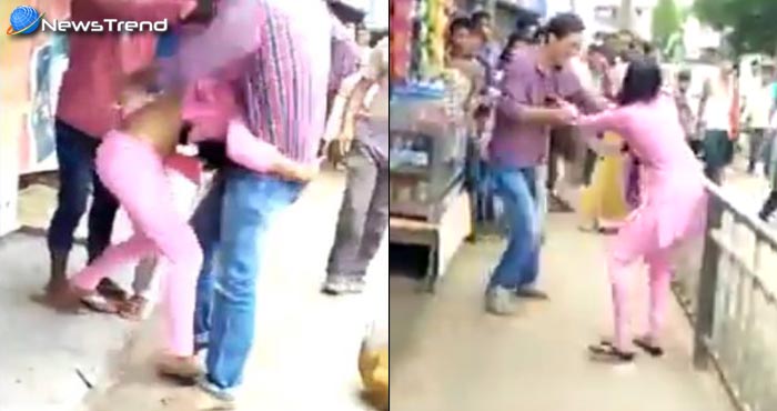देखें वीडियो : बीच बाज़ार लड़के-लड़की में चले लात-घूंसे, फाड़ ड़ाले एक-दुसरे के कपड़े!