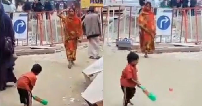 छोटे बच्चे के साथ गली क्रिकेट खेलती इस माँ का Video दिल जित लेगा
