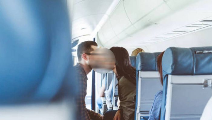 Couple Kissing On pakistan Flight