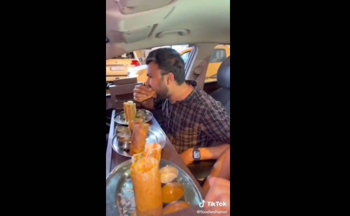 eating dosa in car