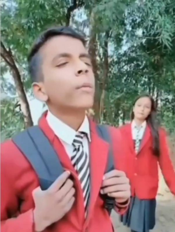 school boy singing song