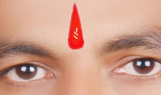 tilak with rice on forehead