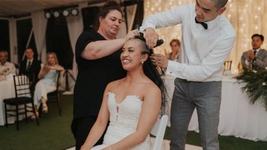 Bride and groom shave heads on their wedding