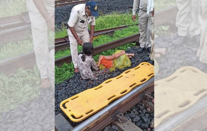 mother daughter on train track