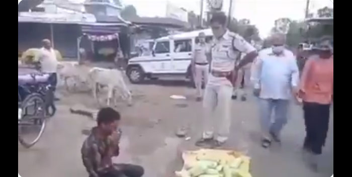 policeman helped handicapped corn seller