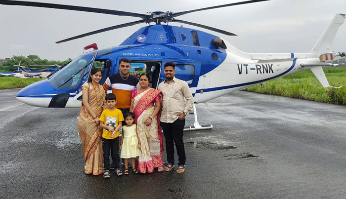 son gifts helicopter trip to monther on her 50th birthday