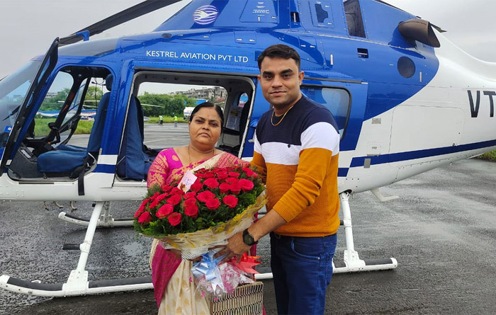 son gifts helicopter trip to monther on her 50th birthday