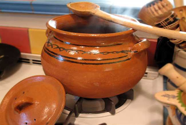 food in clay pot