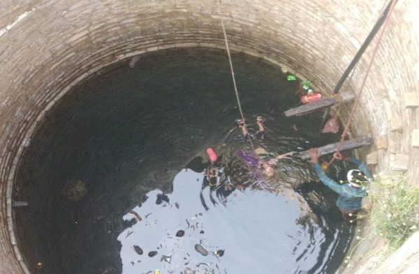 body in well