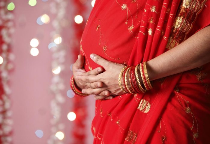 pregnant woman in saree