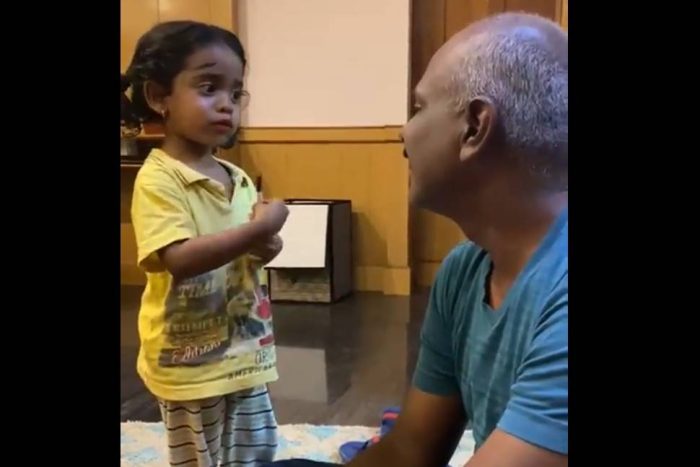 daughter doing makeup of father 